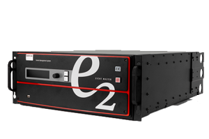 Barco Event Master E2 4K video processor—black rack-mounted unit with front display, control knob, and side handles; used for professional event and video production systems.