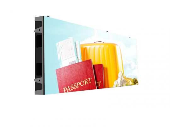 Rectangular digital display screen showing a close-up of passports, boarding passes, and a yellow suitcase set against a bright blue sky background – perfect for travel and airport advertisements.