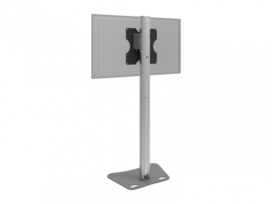 Silver Stand TV Pro freistehender, vertikaler TV-Ständer aus silbernem Metall mit flacher Bodenplatte; ein rückseitig montierter Flachbildschirm zeigt die stabile Halterung und eine zentrale Stützstange - ideal zum Mieten oder Kaufen für Veranstaltungen, Büros oder Präsentationen.