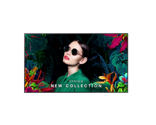 Logando News: Frau mit Sonnenbrille und grünem Outfit vor tropischem Hintergrund - Frühjahrs-Kollektion 2024 entdecken.